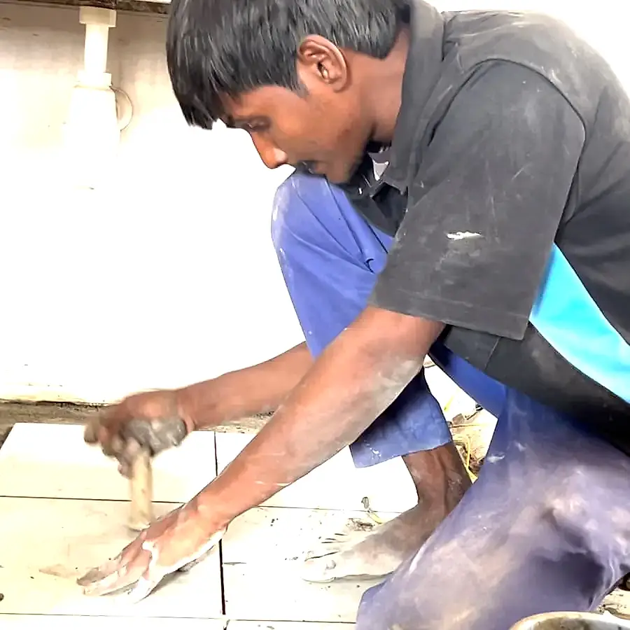 Stone & Tiles Repair Services in Bangalore stones replacement Tile replacement work in progress by Clean Fanatics technician